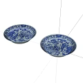 Two Blue And White Ceramic Plates With Traditional Patterns On White Background 3d model