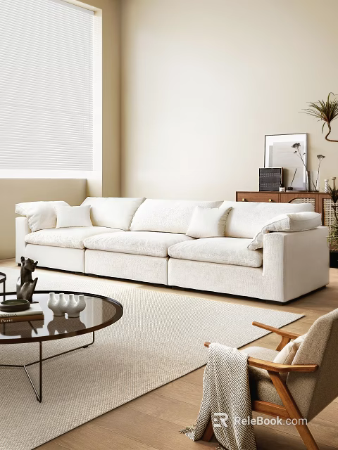 White Three Seater Sofa in Modern Living Room with Round Coffee Table and Soft Rug 3d model 