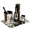 Elegant Wine Bottles And Glasses With Silver Ice Bucket And Sternberg Accessories On Tray