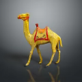 Yellow Camel Figurine With Red Decorative Saddle On Black Background