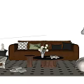 Brown Leather Sofa With Cushions And Wooden Coffee Table With White Flowers On Checkered Rug
