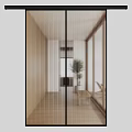 Modern Glass Sliding Doors With Wooden Frames In Bright Interior Hallway With Plant And Chairs