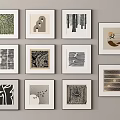 Multiple Picture Frames With Artistic Prints On Gray Wall Home Decor 3d model