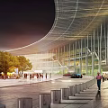 Modern Public Building with Curved Roof at Night Pedestrians Walking Near Trees in Plaza