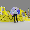 Smiley Face Themed Playground With Interactive Elements People Playing And Yellow Decorations