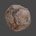 Round Brown Food Item With Cracked Textured Surface And Natural Organic Look