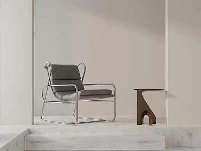Gray Leisure Chair With Metal Frame And Side Table By Light Wall And Marble Steps 3d model