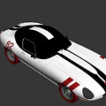 Silver Vintage Sports Car With Black Stripes Sleek Body Round Headlights And Black Roof