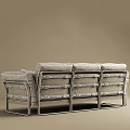Modern Three Seater Sofa With Light Gray Upholstery Black Pillows And Metal Frame