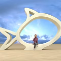 White Fish Shaped Sculpture Photo Spot With Person Sitting And Blue Sky Sandy Ground