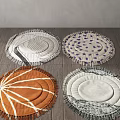 Round Rugs with Fringed Edges in Various Colors and Patterns on Wooden Floor