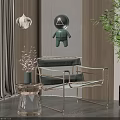 Modern Leisure Chair With Green Velvet Seat Metal Frame Wooden Wall And Glass Table Plant