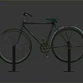 Vintage Green Bicycle Displayed On Black Stands With Gray Background