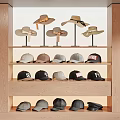 Various Fashionable Hats Including Wide Brim And Baseball Caps On Wooden Shelves