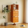 Modern Wooden Bookcase With Drawers Shelves And Potted Plant Near Light Wall
