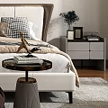 Modern Bedroom Interior Featuring Comfortable Bed Area Rug Accent Chair And Wall Art