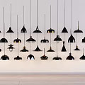 Various Black and Gold Pendant Lights with Unique Designs for Interior Decor