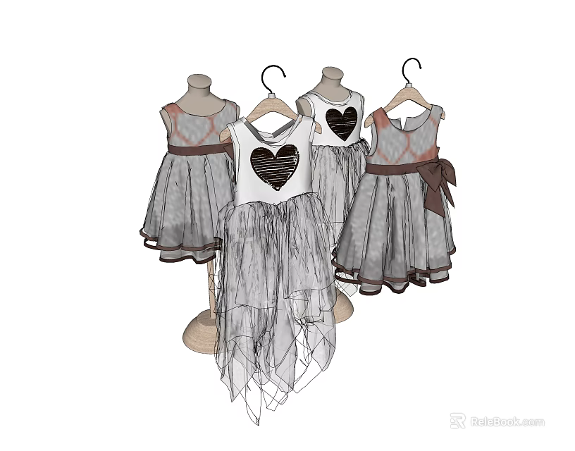 Mannequins Displaying Elegant Tulle Dresses With Heart Patterns And Ribbon Belts 3d model 