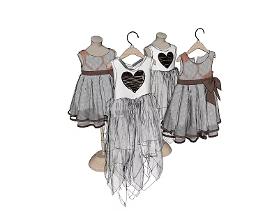 Mannequins Displaying Elegant Tulle Dresses With Heart Patterns And Ribbon Belts 3d model