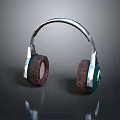 Modern Computer Headphones With Silver Headband Green Earcups And Brown Padded Cushions
