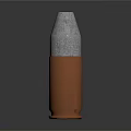 Copper Cased Bullet With Silver Top Shiny Surface On Black Background