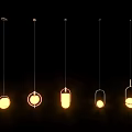 Modern Pendant Lights With Different Designs Illuminated In Yellow Glow On Black Background