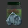 Glass Jar With Green Lid And Green Liquid Alongside Light Blue Slippers