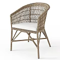 Woven Rattan Single Chair With White Cushion And Crossed Legs Design