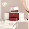 Elegant Red Jewelry Organizer Set With Mirror Drawers Cosmetics And Pink Rose Vase On Desktop