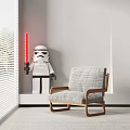 Light Gray Fabric Leisure Chair With Wooden Armrests And Lego Stormtrooper Holding Red Lightsaber