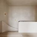 Minimalist Curved Staircase With White Walls Wall Lamps And Wooden Floor