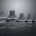 Different Sizes Gray Metal Bolts With White Washers On Dark Smooth Surface