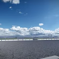 Highway Fence Along Road With Blue Sky White Clouds And Green Grassland