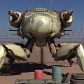 Camouflage Painted Mechanical Crab Sculpture With Cannons Barbed Wire Wooden Crates Oil Drums Blue Sky