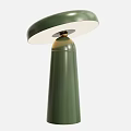 Two Green Table Lamps With Different Heights Round Tops And Gold Accent Details