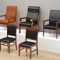Brown And Black Leather Office Chairs With Wooden Legs And Armrests