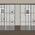 Modern Glass Sliding Doors With Black Frames And Artwork On Wooden Floor