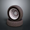 Stacked Car Tires Displaying Exposed Metal Rim And Detailed Tread Design