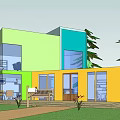 Modern Colorful Office Building With Large Glass Windows And Surrounding Trees