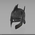 Warrior's Silver Helmet With Intricate Carvings Pointed Top And Reflective Metallic Surface