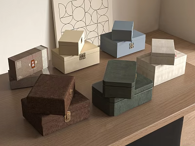 Various Colored Tea Set Storage Boxes Displayed on Wooden Table with Geometric Art 3d model