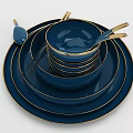 Elegant Multicolor Dinnerware Set with Stacked Plates Bowls and Gold Rim Spoons