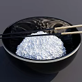 Everyday Tableware Set With Black Bowl Containing Rice And Chopsticks On Top