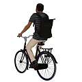 Man riding bicycle in striped shirt with khaki pants and backpack