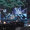 Modern Futuristic Bar Interior With Large Sculptural Installation Lighting Blue Sofas And Screens