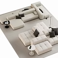 Modern Sectional Sofa With Beige Upholstery Black Cushions Side Tables And Floor Lamp