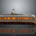 Model Train with Silver Body Pantograph Orange Lit Windows and Reflection on Gray Background