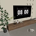 Modern Wooden TV Stand With TV Decorative Items And Green Plant In Bright Room