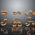 Golden Spiral Curly Design Decorative Household Items Arranged On Grey Background With Reflections