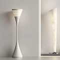 Modern White Floor Lamps With Spiral Design And Textured Shade In Minimalist Setting